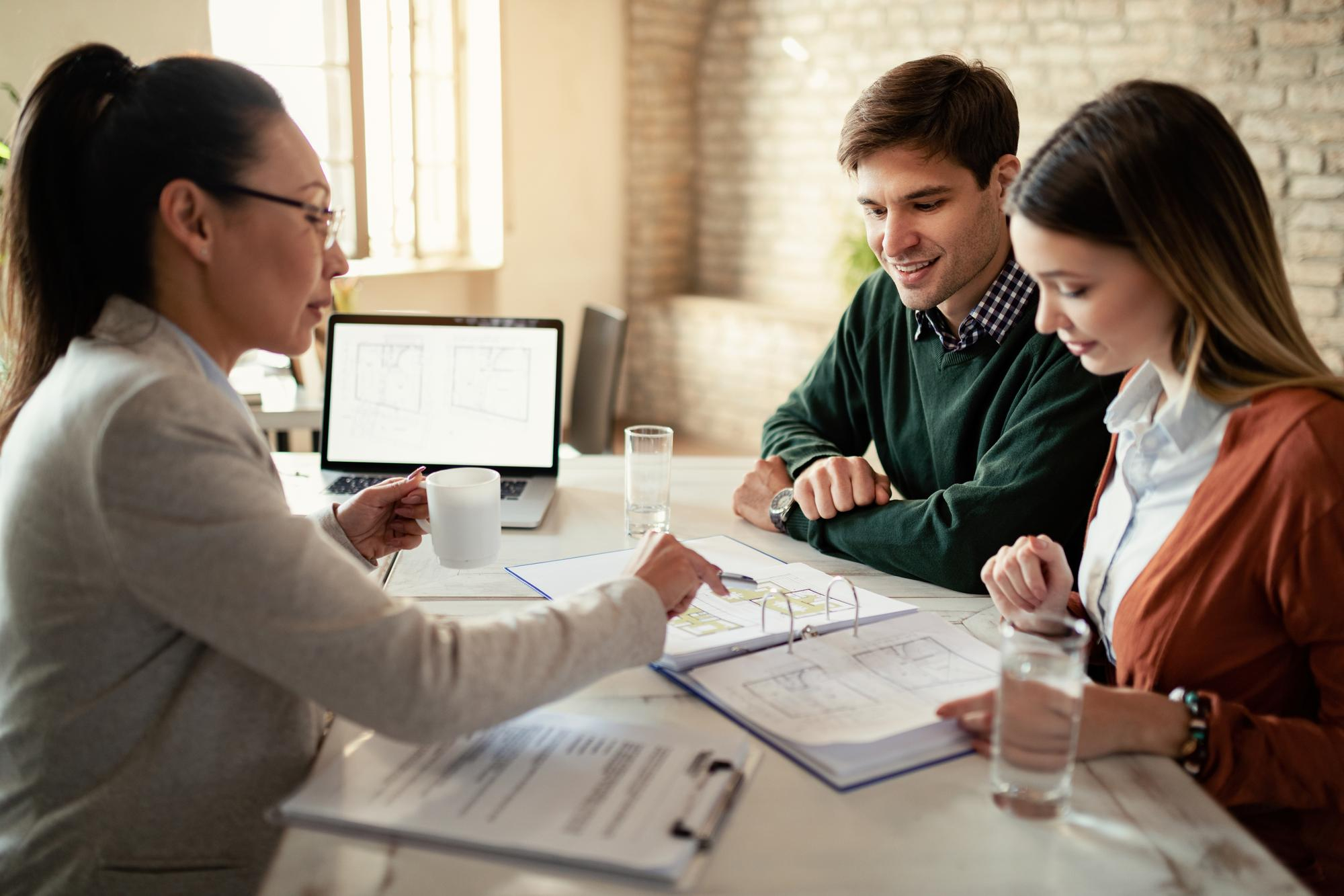 A professional office setting with modern accounting tools, a focused accountant working on a laptop, surrounded by financial documents and charts, (professional:1.5), (clean:1.3), (modern:1.2) - [distracting elements], [negative prompt: low quality, blurry, cartoonish]